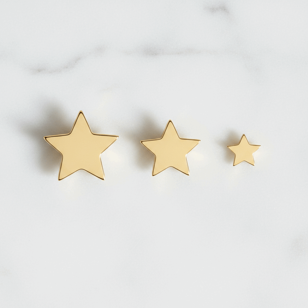 3 Plain Gold Star Studs - Flat Lay