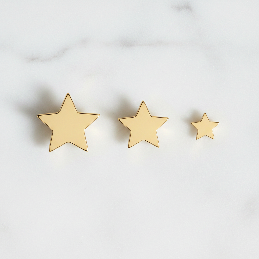 3 Plain Gold Star Studs - Flat Lay