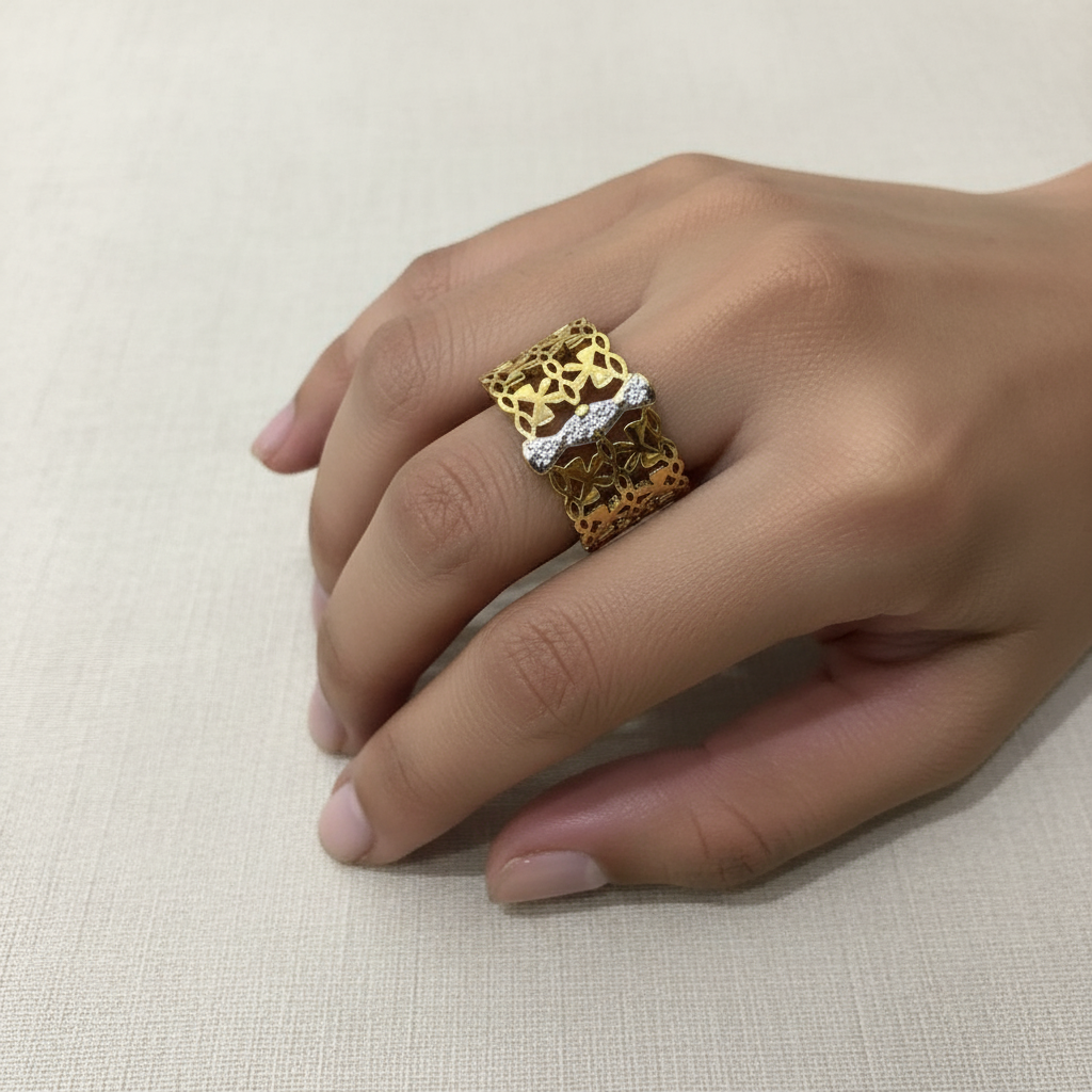 Gold lace ring worn on finger